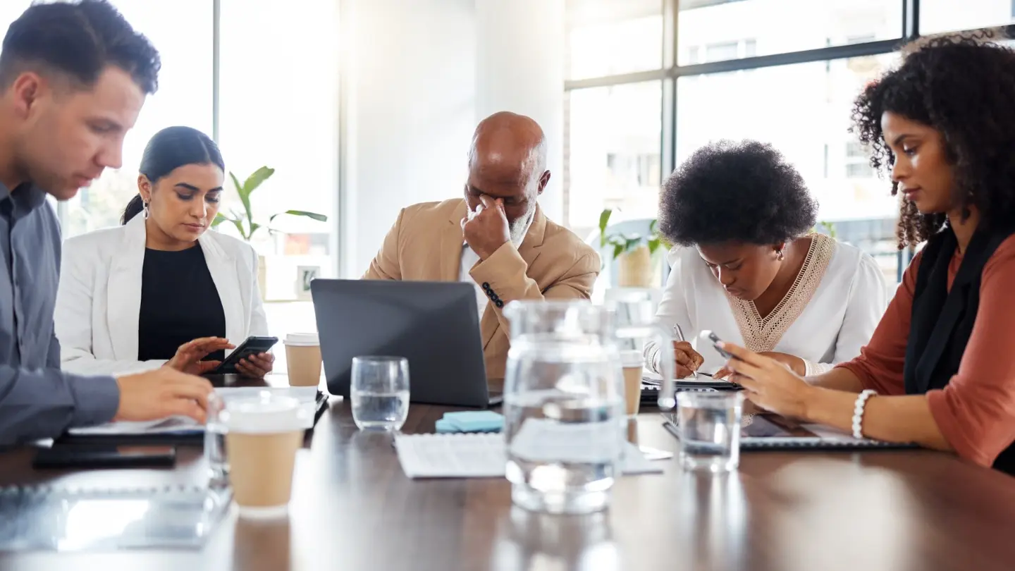 Business team experiencing disruption from unreliable technology